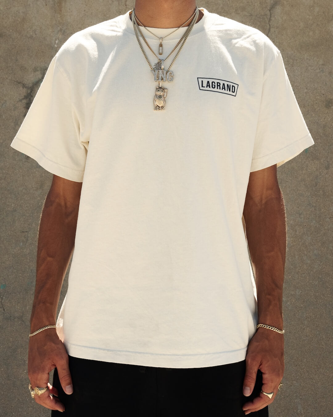 Front view of LAGRAND Station Tee in Ivory with left chest logo